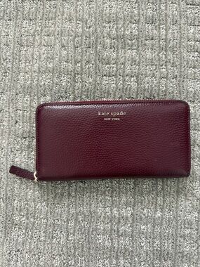 kate spade Leather Zip-Around Wallet in Burgundy